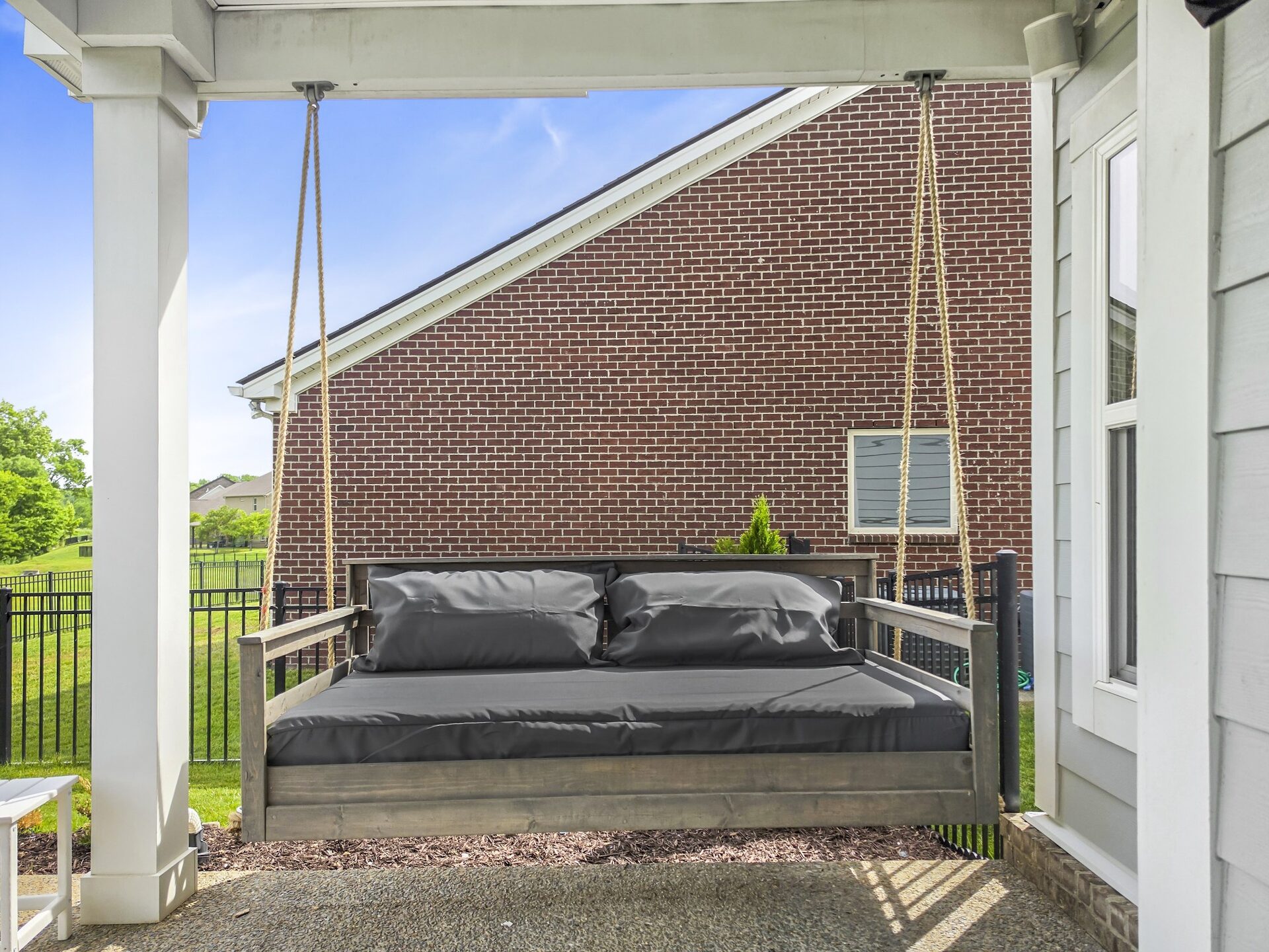 Covered porch with swing